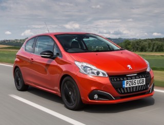 Peugeot new 208 with 65 plate side front action