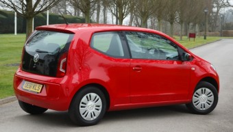 VW Move up! 1.0 litre 60 PS (2012), Tournado red, Danesfield House, Marlow, Bucks., UK